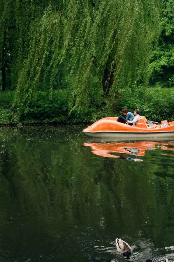 Paddle boat experience in a green Berlin park